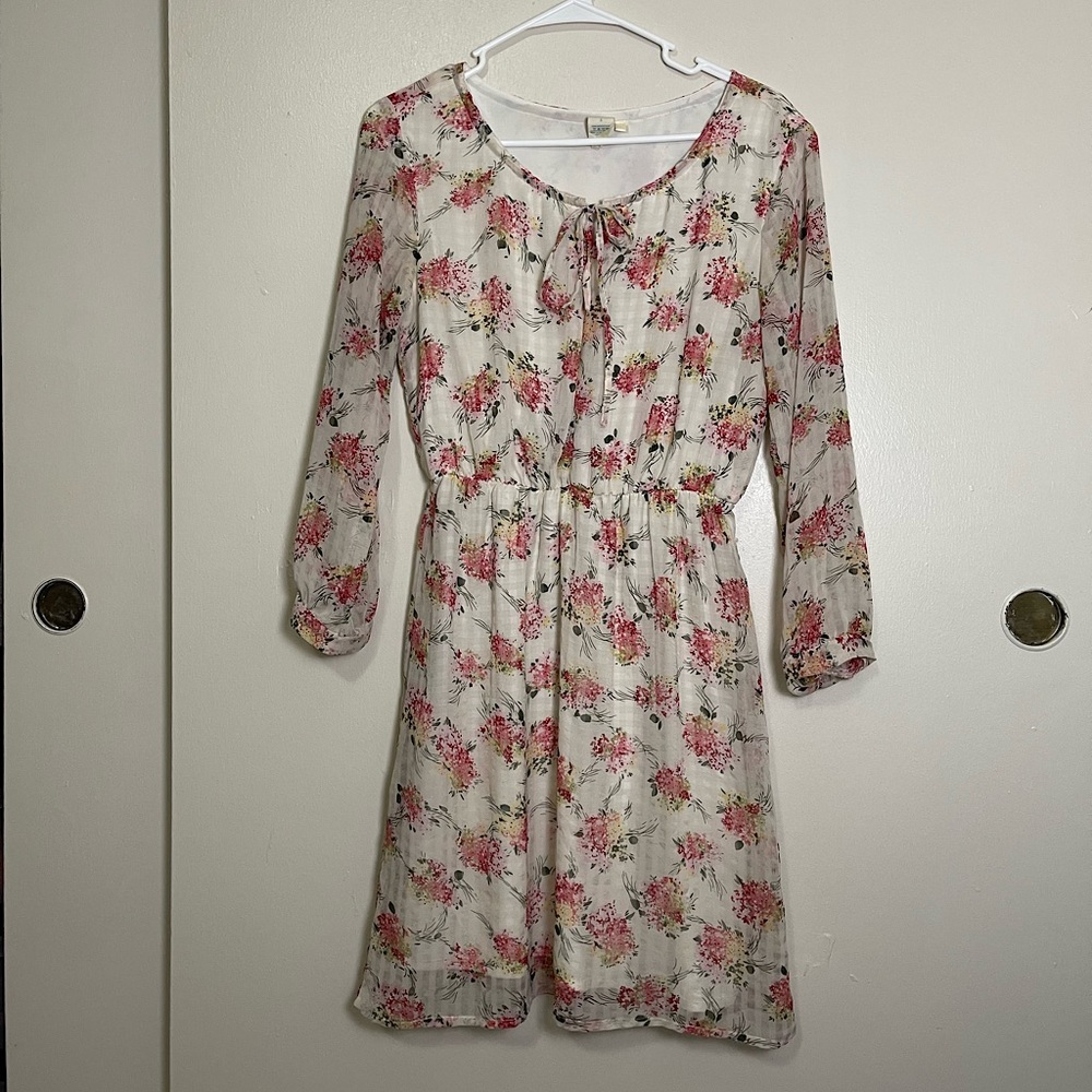Floral  patterned long sleeve mini dress. Small